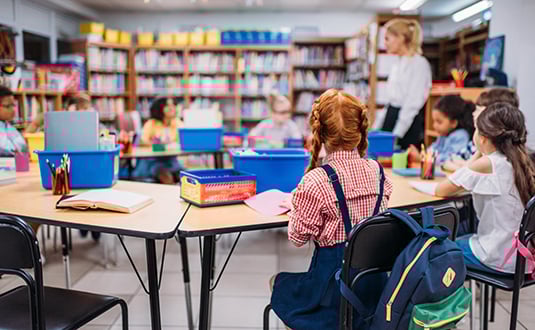 This image shows a group of students in a classroom, whose attendance CommunityPass's afterschool program management software can track. This image shows a group of students in a classroom, whose attendance CommunityPass's afterschool program management software can track.